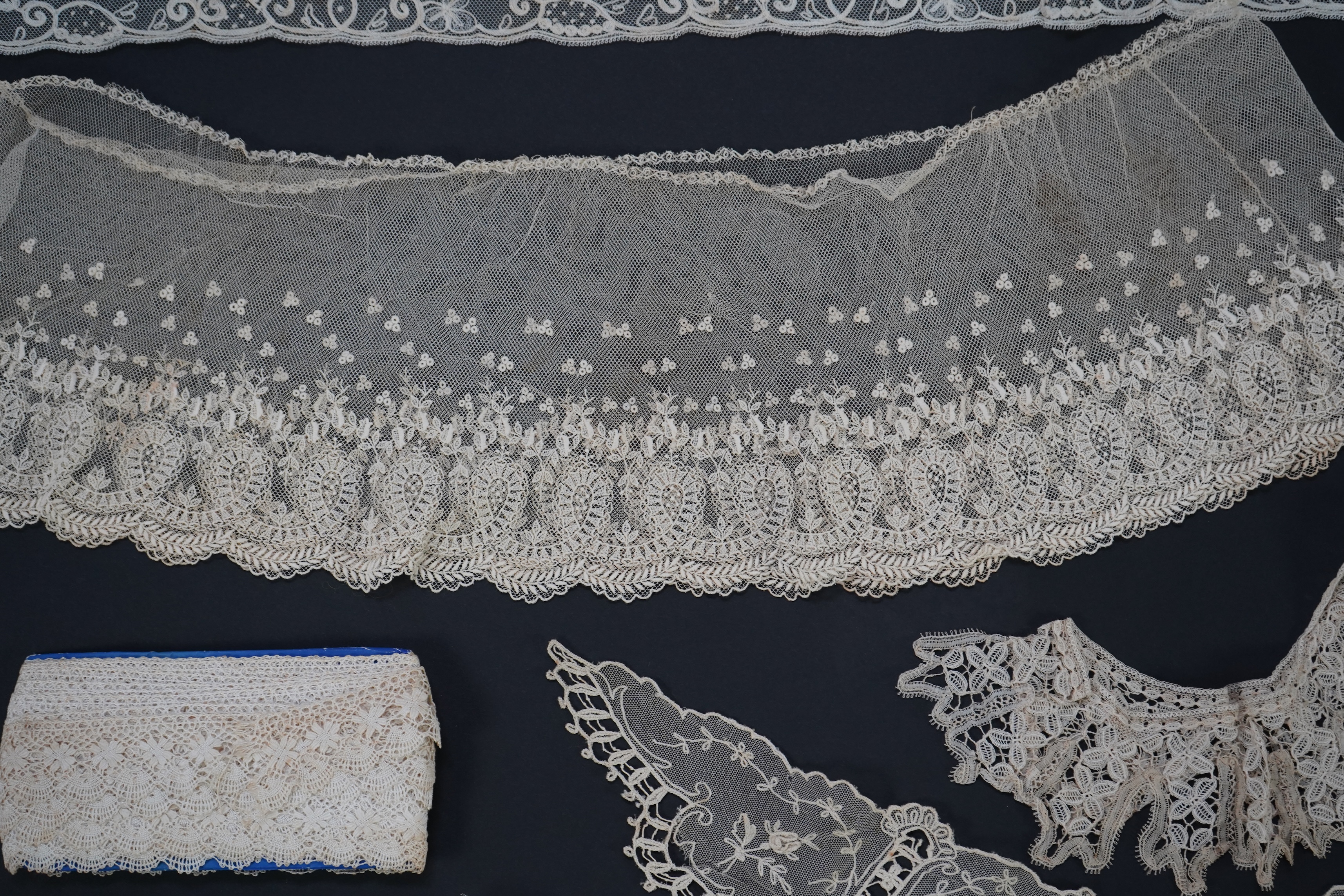 A variety of 19th and 20th century cream lace, being mixed hand and machine collars, lappets, trimmings together with a silk stole. Ideal for tv, film and theatre, stole 230 cm long. Condition - good